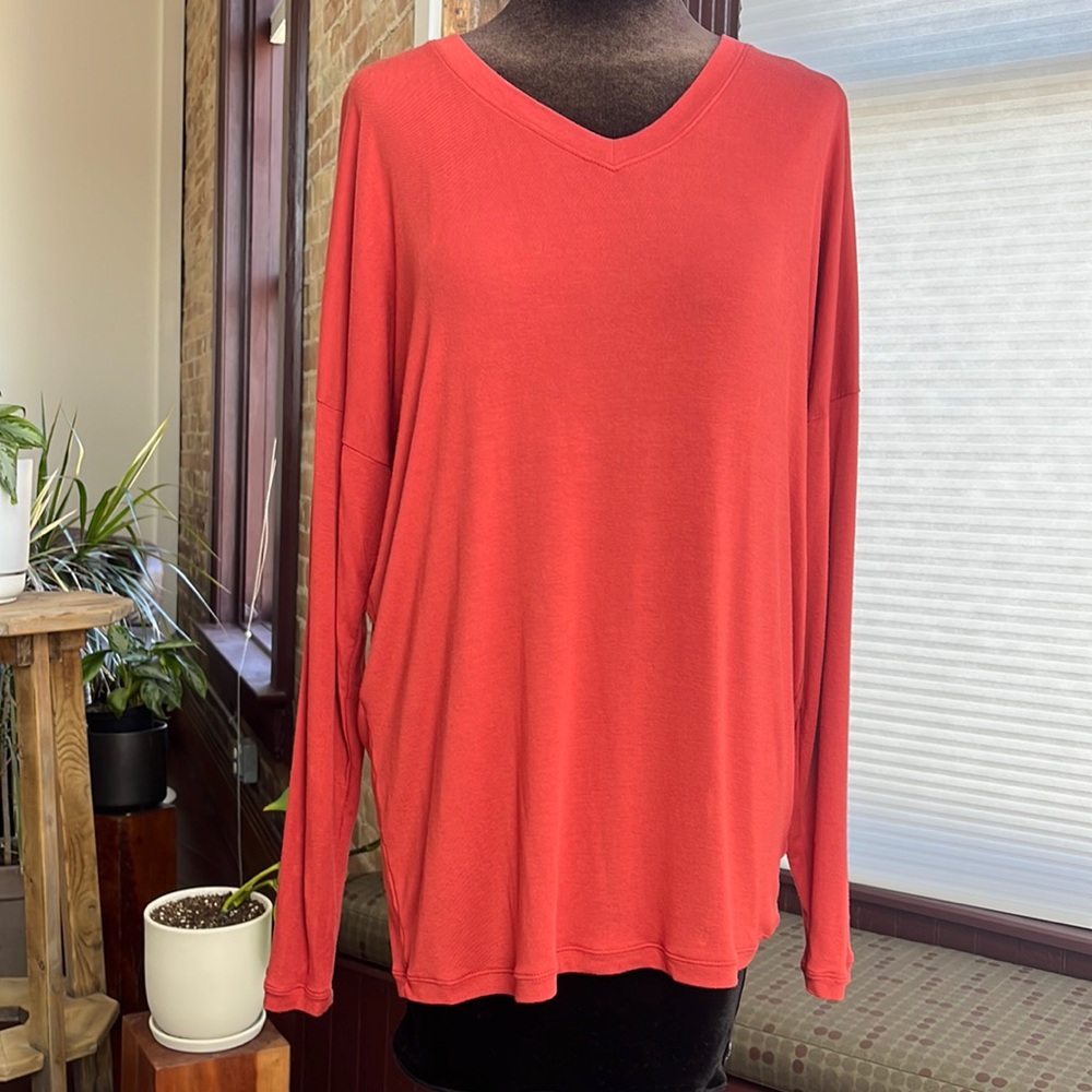 Red long sleeve with warm undertone